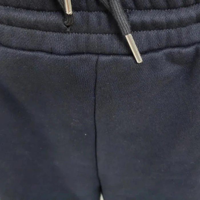 Close-up of the black drawcords with metal tips