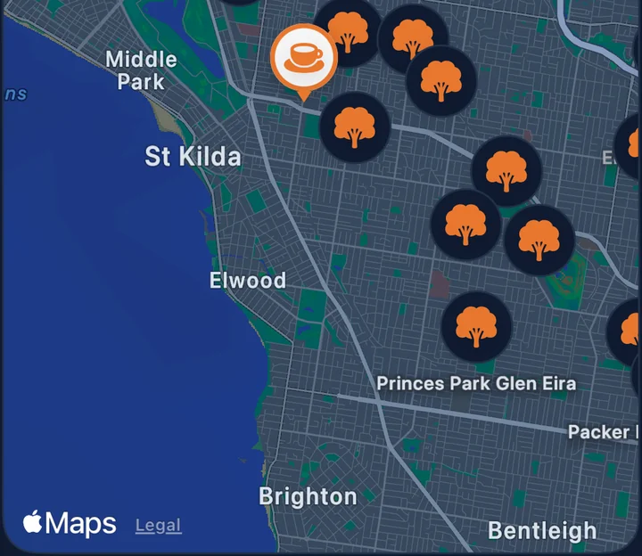 The app's parks map around St Kilda and Elwood, with orange park pins and a café pin
